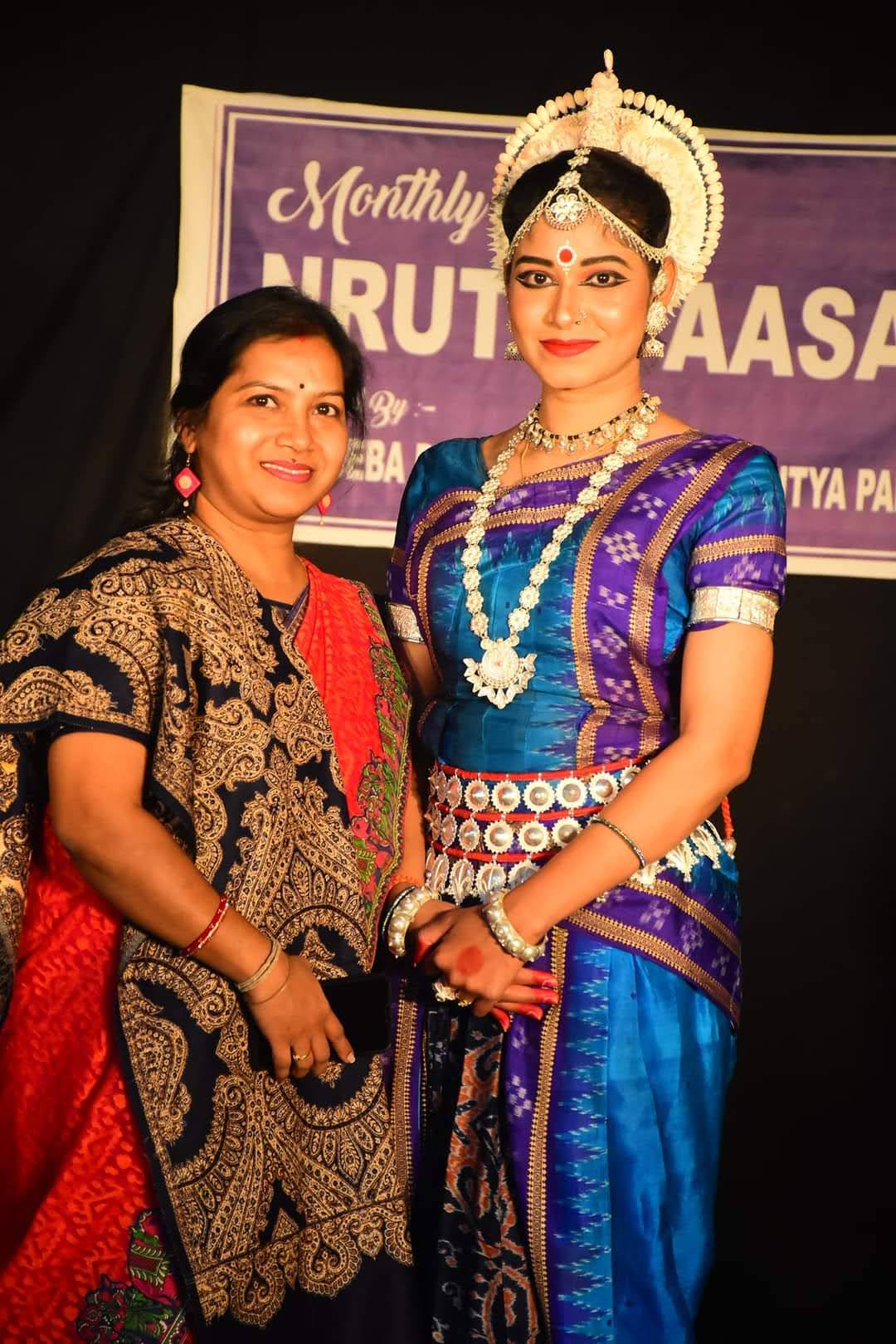 Guru with student at the Monthly Nrutya Maasa showcase event