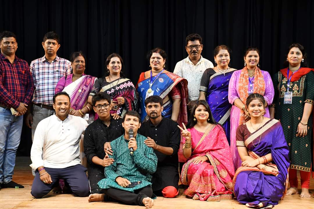 Group photo of academy members and guests at a felicitation event