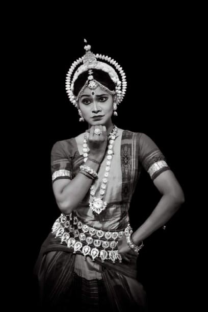 Monochrome portrait of an Odissi dancer in full costume